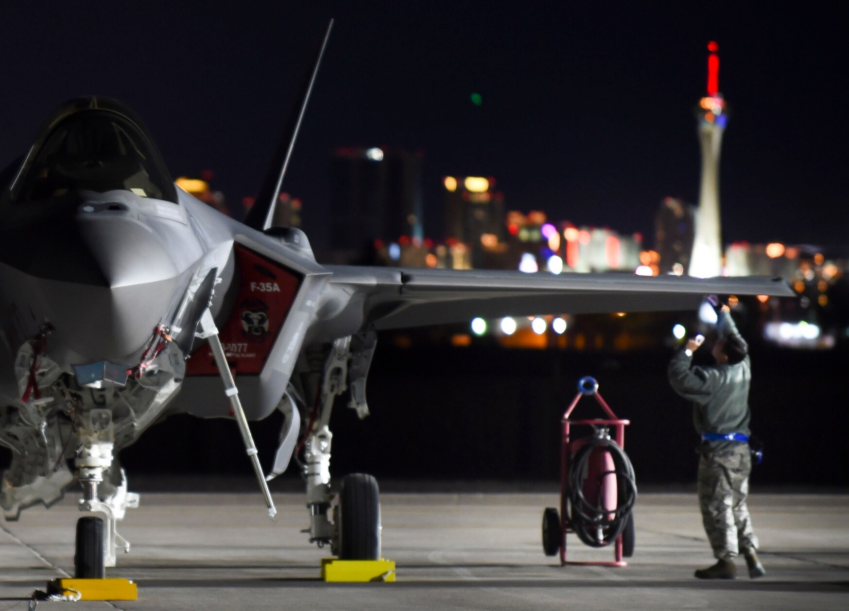 A maintainer with the 388th Fighter Wing out of Hill Air Force Base, Utah, checks for structural damages on an F-35A during Red Flag 17-1 at Nellis Air Force Base, Nev., on Jan. 25, 2017. (Staff Sgt. Natasha Stannard/U.S. Air Force)