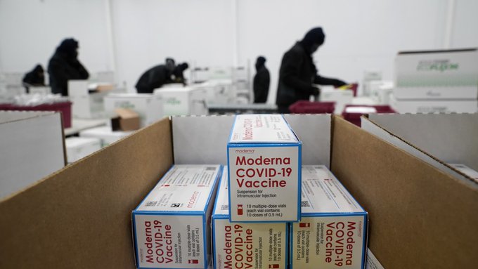 Boxes containing the Moderna COVID-19 vaccine are prepared to be shipped at the McKesson distribution center in Olive Branch, Miss., Sunday, Dec. 20, 2020. (AP Photo/Paul Sancya, Pool)