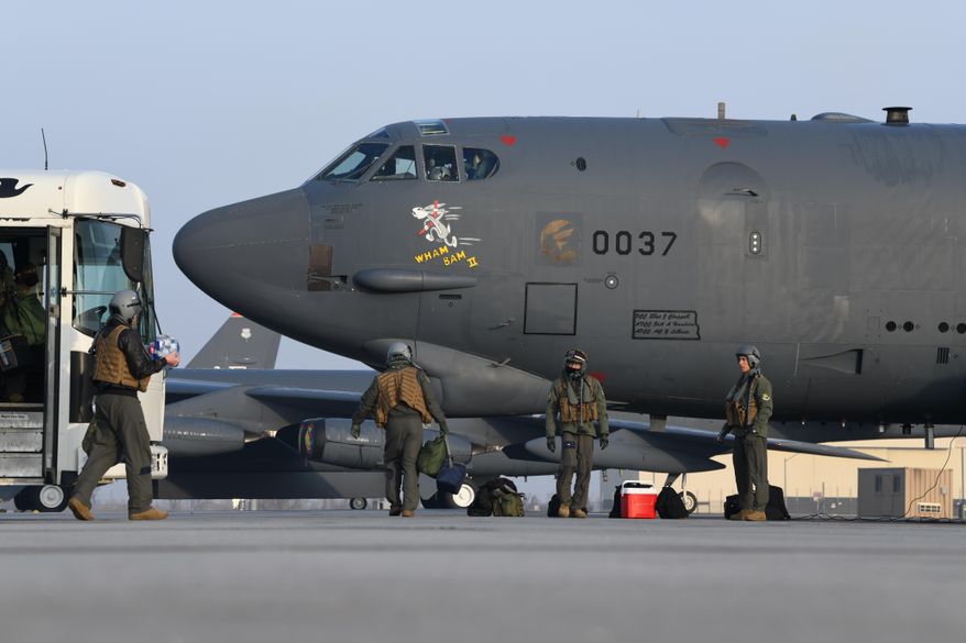 Pilots from the 69th Bomb Squadron board B-52H Stratofortress bomber &amp;quot;Wham Bam II&amp;quot; in preparation for a flight over the Mideast on March 6, 2021, at Minot Air Force Base, North Dakota. A pair of B-52 bombers flew over the Mideast on Sunday, March 7, 2021, the latest such mission in the region aimed at warning Iran amid tensions between Washington and Tehran. (U.S. Air Force/Senior Airman Josh W. Strickland via AP)