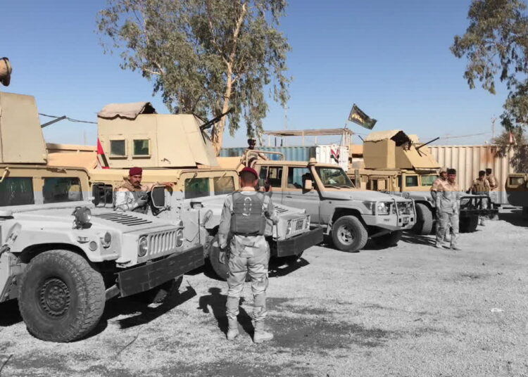 Iraqi Army personnel at the border crossing that links Iraq's Al-Anbar Governorate with Syria's Deir Ezzor Governorate. (Ruptly)