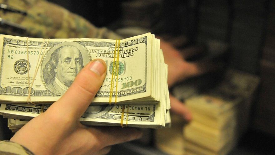 U.S. bills. Credit: Sgt. Sinthia Rosario/U.S. Army.